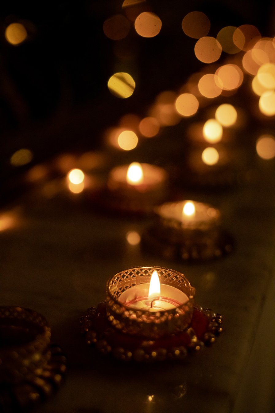 Lighted Candles on Windowsill